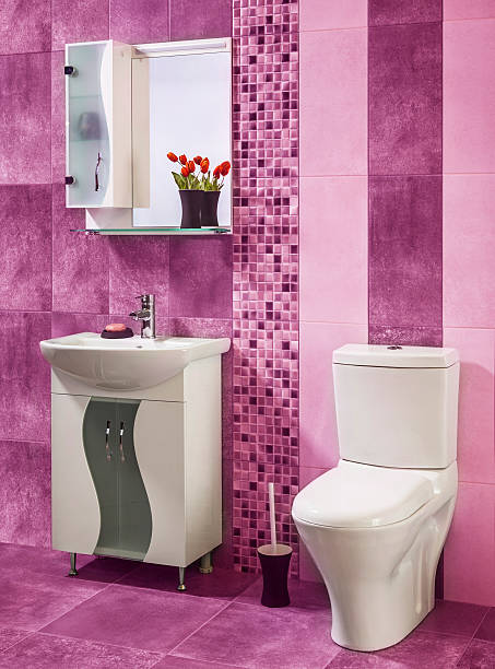 istock beautiful and stylish bathroom in pink 518557976