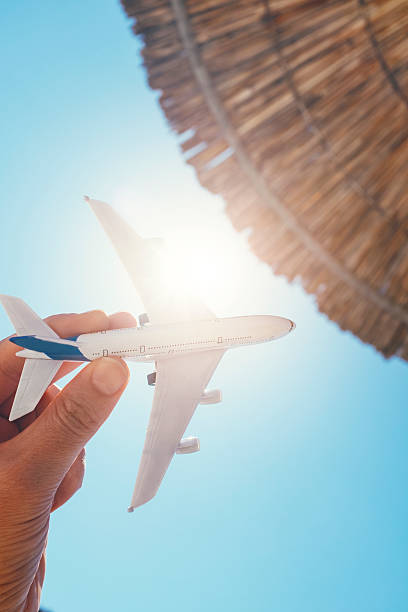 istock Sun shines on small plane on vacation 518558974