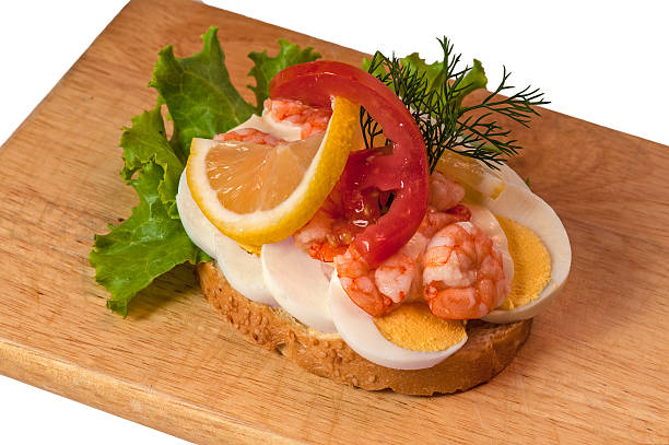 istock Scandinavian eggs and shrimps sandwich 518559112