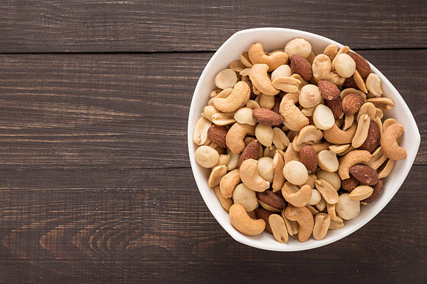 istock Almond, macadamia, peanut, cashew are in a blow. 518560968