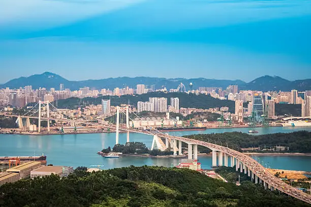 aerial view of xiamen haicang bridge at dusk ,a beautiful coastal city