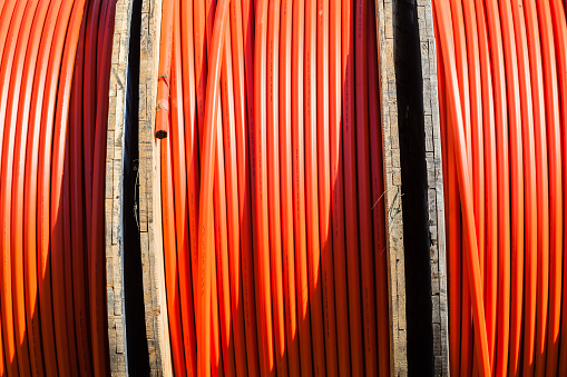 Communications internet technology fibre optic cables on drum ready for installation