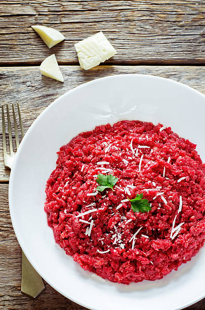 istock risotto with beetroom 518563505