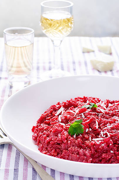 istock risotto with beetroom 518563515