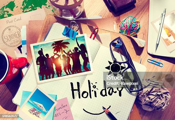 Desk With Summer Photographs And Notebook Stock Photo - Download Image Now - Adhesive Note, Beach, Coffee Cup