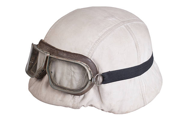 istock camouflaged nazi german helmet with protective goggles 518564397