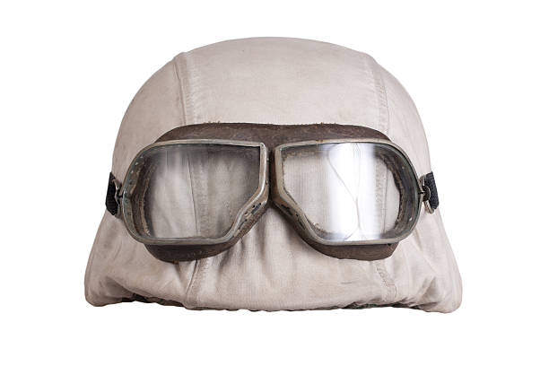 istock camouflaged nazi german helmet with protective goggles 518564399