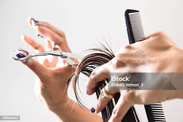 Hand With A Comb Cutting Hair Of Woman Stock Photo - Download Image Now - Hairdresser, Hair Salon, Cutting Hair