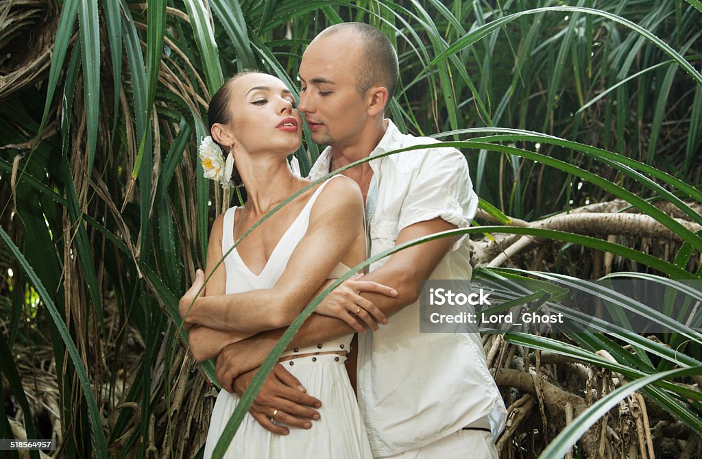 Love story in jungle The love story of a beautiful couple in the jungle Adult Stock Photo