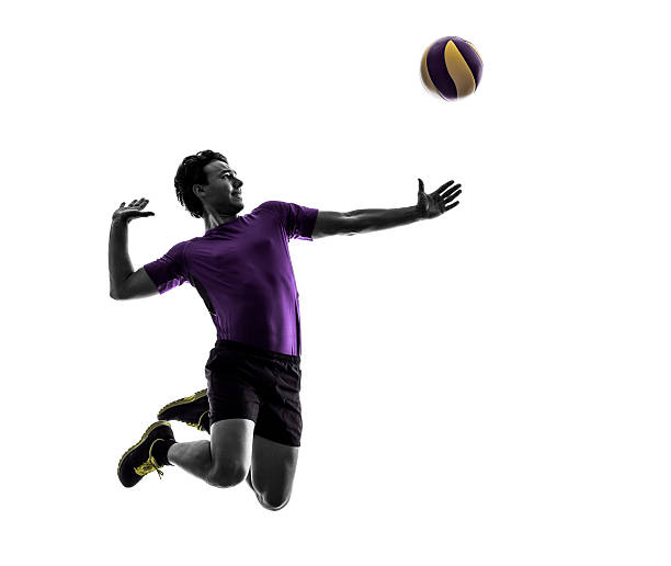istock volley ball player man silhouette white background 518565929