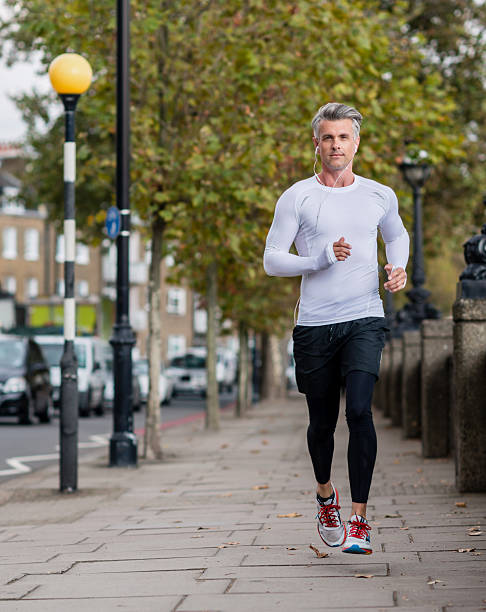 istock Man running outdoors 518567211