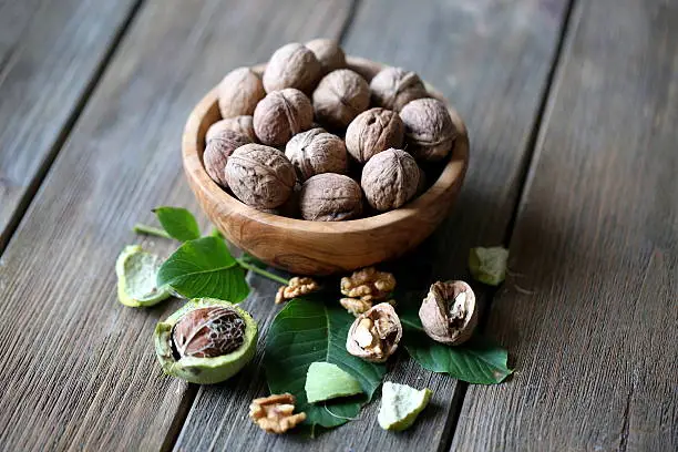 walnuts in olivewood bowl