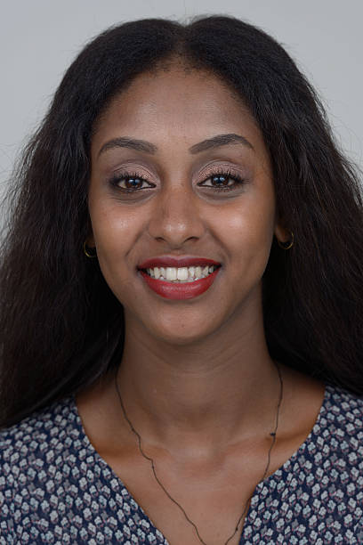 istock African woman smiling 518586334