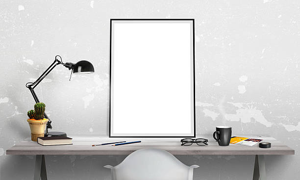 istock Isolated poster frame on office desk for mockup. Lamp 518586866