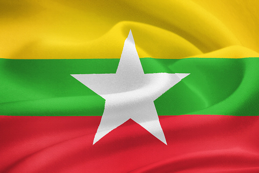 flag of Myanmar waving in the wind. Silk texture pattern