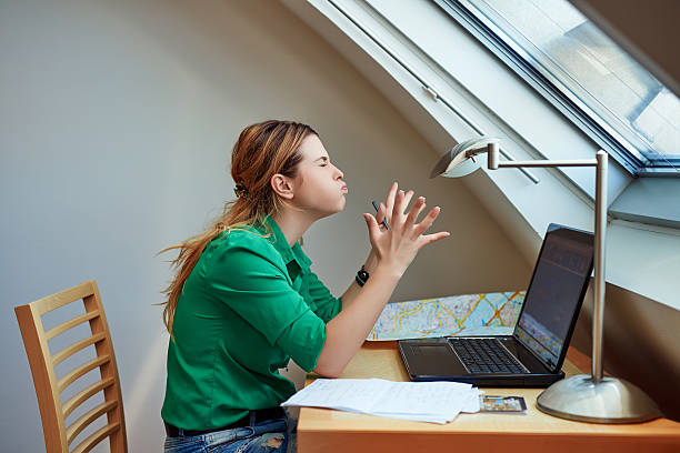 angry on my hard work side view of freelancer woman working from home, feeling angry on her hard work, negative attitude, furious stock pictures, royalty-free photos & images