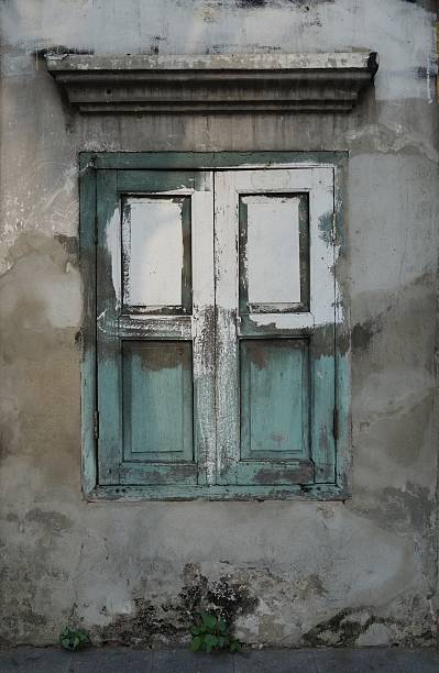 istock Old painted wooden window 518588480