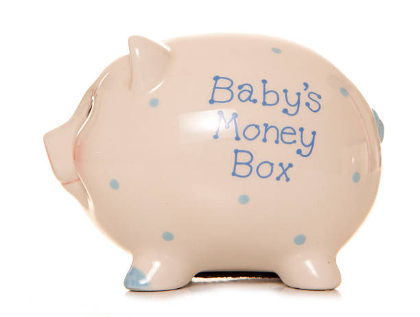 istock Babys first money box piggy bank 518588913