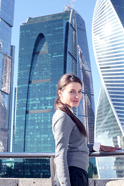 istock Businesswoman at skyscraper background 518589150