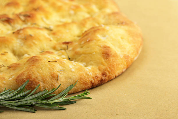 istock flatbread and sprig of rosemary 518589355