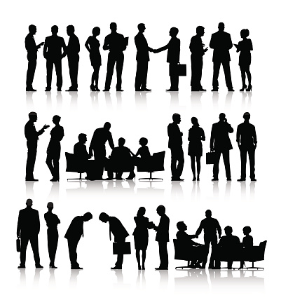 Vector of Silhouettes of Business People Working