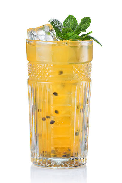 istock Yellow alcohol cocktail with passionfruit isolated 518589738