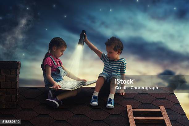 Children Reading A Book Stock Photo - Download Image Now - Child, Book, Reading