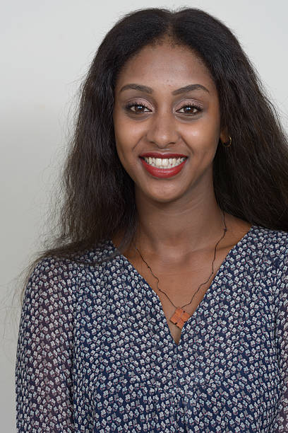 istock African woman smiling 518589908