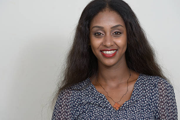 istock African woman smiling 518590088