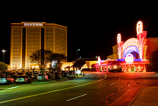 Tunica, Mississippi, USA - March 28, 2016: Gold strike and Horseshoe casino hotels along the Tunica Casino Strip Boulevard at night.