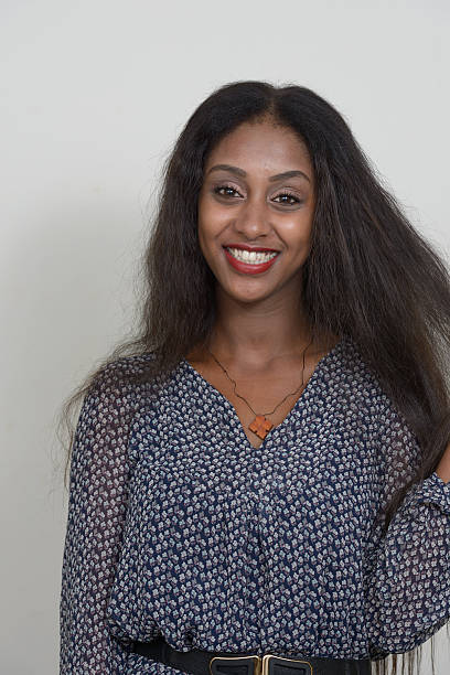 istock African woman smiling 518590190
