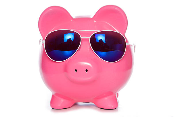 istock piggy bank with sunglasses 518590497