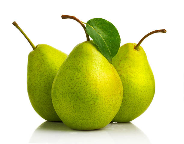 istock Three green pear fruits with leaves isolated 518590526