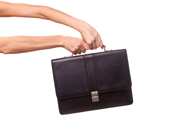 istock Woman hands and suitcase. 518591017