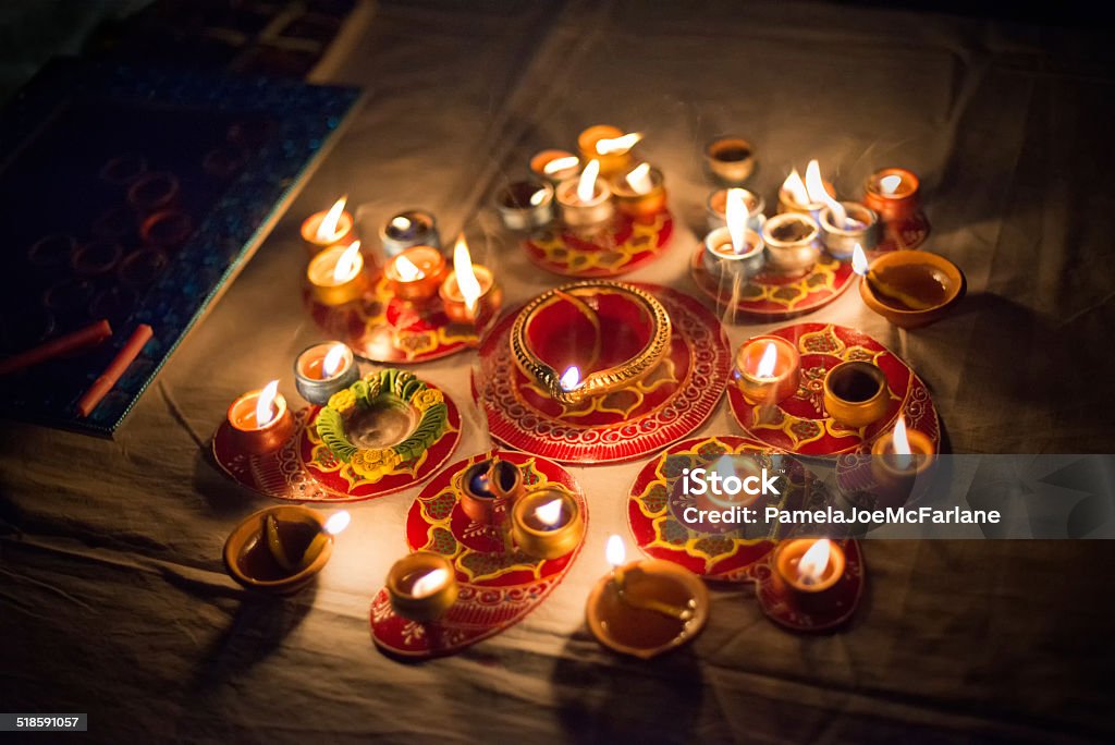 Diwali Candles and Oil Lamps at Night Candles and oil lamps are lit for Diwali, an annual Hindu festival.  Jaipur, India Diwali Stock Photo