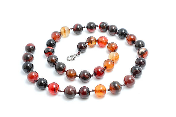 istock beads from natural stones isolated 518591256