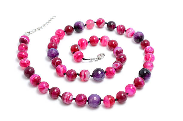 istock beads from natural stones isolated 518591286