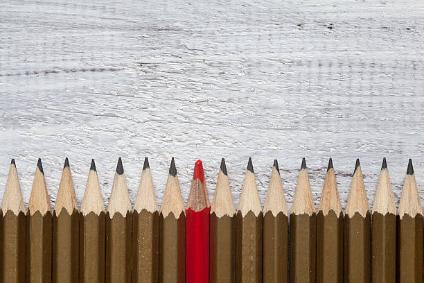 istock Pencil on wooden background 518591352