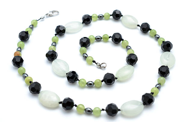istock beads from natural stones isolated 518592338