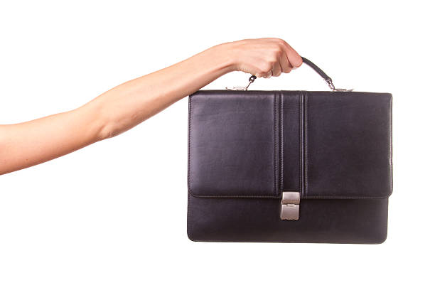 istock Woman hands and suitcase. 518592487
