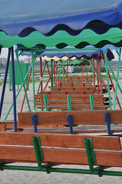 istock sheds from the sun with benches 518592826
