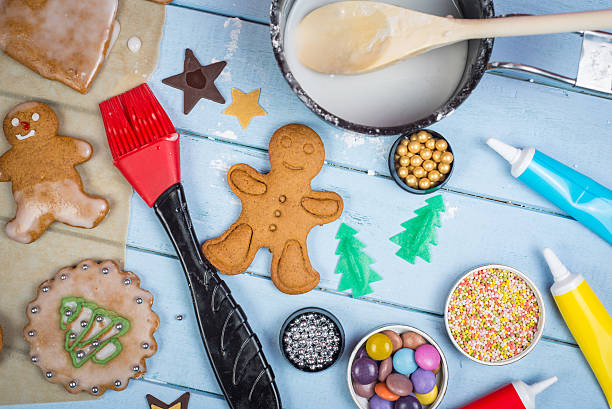 istock Decorating of gingerbread man Christmas cookie 518593093