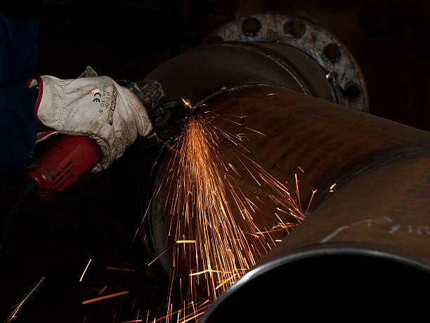 istock Man grinding steel 518593835
