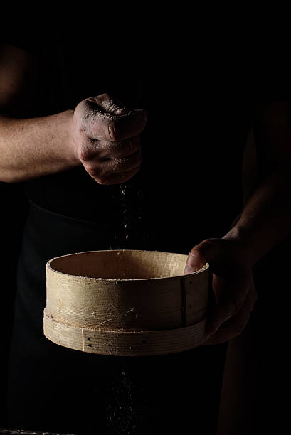 istock In the men's hands dough and flour 518593888