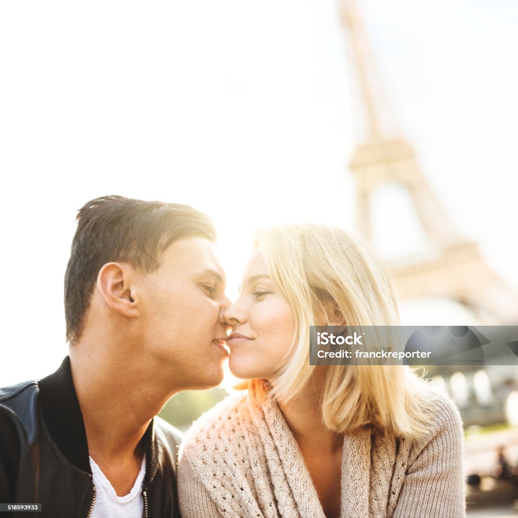 romantic couple kissing at sunlight on Paris http://blogtoscano.altervista.org/pac.jpg  Kissing Stock Photo