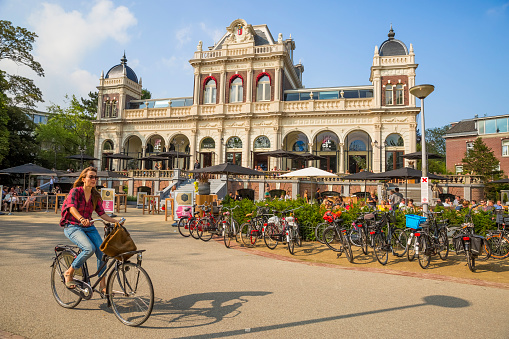 Amsterdam, Netherlands - July 26, 2014: Park Cafe in VondelPark in Amsterdam. The Vondelpark is a public urban park of 47 hectares in Amsterdam, Netherlands. The park was opened in 1865 and originally named the \