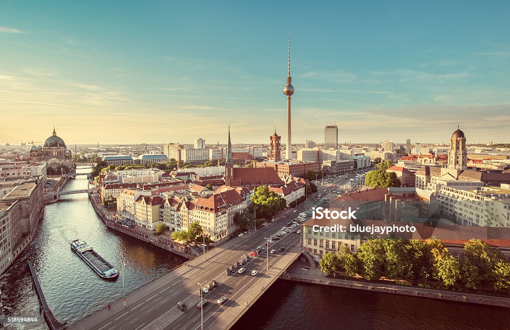 Berlin skyline with Spree river in summer, Germany Aerial view of Berlin skyline with famous TV tower and Spree river in beautiful evening light at sunset with retro vintage Instagram style grunge pastel toned filter effect, Germany. Berlin Stock Photo