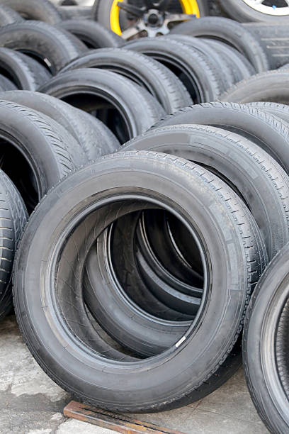 istock Pile of used rubber tyres. 518595054
