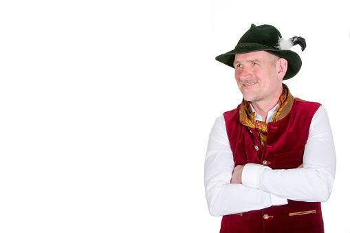 isolated portrait of bavarian man in traditional clothes looking to the side