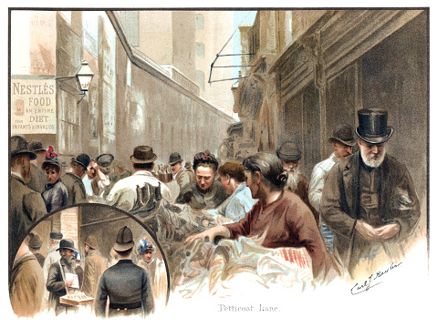 London, England - February 12, 2016: Petticoat Lane market in London’s East End, crowded with 19th century stall holders and shoppers: includes an inset showing a policeman and an itinerant trader. From “Souvenir of London - 14 fac-Similes (sic) of Water-Colours by Carl J Becker” published by Henri Nestlé, 9 Snow Hill, EC, London, 1891. The book is an advertising publication by the chocolate manufacturers Nestlé and most of the paintings bear some advertising for their products.